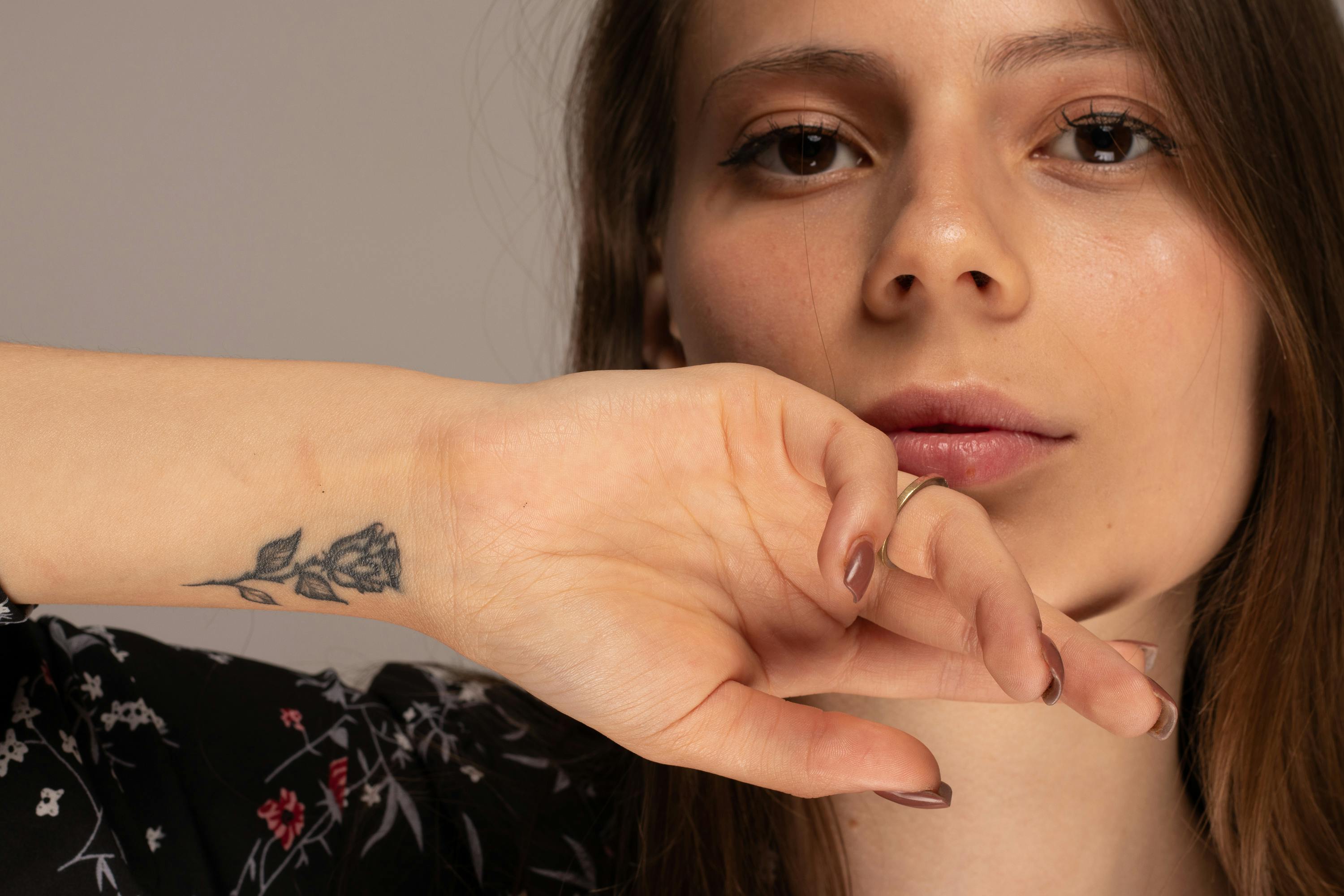 Tiny star tattoo on ankle